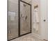 Stylish bathroom featuring a glass shower with tiled walls and modern fixtures at 58 Ashbury Cir, Dallas, GA 30157