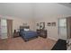 Bedroom with a bed, two dressers, and two windows providing natural light at 58 Ashbury Cir, Dallas, GA 30157