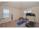 Bright home gym featuring exercise equipment, natural light and ample space at 58 Ashbury Cir, Dallas, GA 30157