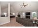 Spacious main bedroom with a seating area, TV, and large windows at 58 Ashbury Cir, Dallas, GA 30157