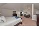 Large bedroom with a comfortable seating area and vaulted ceiling at 58 Ashbury Cir, Dallas, GA 30157