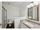 Modern bathroom featuring a tiled shower with glass door and a granite countertop at 840 United Se Ave # 411, Atlanta, GA 30312