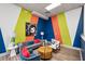 Modern lounge with comfortable seating, vibrant wall art, and stylish decor at 840 United Se Ave # 411, Atlanta, GA 30312