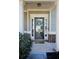 Inviting front door with decorative wreath, sidelights, and beautiful trim at 172 Cherokee Reserve Cir, Canton, GA 30115