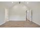 Spacious bedroom with vaulted ceiling, and two entry doors leading to other rooms at 602 Sandhill Hickory Level Rd, Carrollton, GA 30116