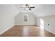 Bonus room featuring hardwood floors, a window and a door providing versatile living space at 602 Sandhill Hickory Level Rd, Carrollton, GA 30116