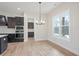 Cozy dining area next to the kitchen with views of the backyard, perfect for Gathering meals at 602 Sandhill Hickory Level Rd, Carrollton, GA 30116