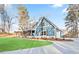 Charming craftsman-style home with a welcoming front porch and well-manicured lawn at 602 Sandhill Hickory Level Rd, Carrollton, GA 30116