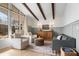 Sitting area showcasing natural light, modern furniture, and hardwood flooring at 665 Lake Charles Way, Roswell, GA 30075