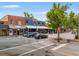 Charming street view of Lola's restaurant, featuring outdoor dining and street-side parking at 665 Lake Charles Way, Roswell, GA 30075