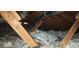 Insulated attic space features wooden beams and modern ductwork for energy efficiency at 3747 Southland Ct, Atlanta, GA 30344