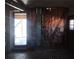 View of a basement with exposed insulation, unfinished walls, and a door to the outside at 3747 Southland Ct, Atlanta, GA 30344