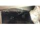 View of the crawl space under the home. There are pipes, cinder blocks, wires, and insulation visible at 3747 Southland Ct, Atlanta, GA 30344