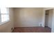 Bedroom featuring a window for natural light and hardwood floors at 3747 Southland Ct, Atlanta, GA 30344