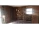 Image displays an unfinished bedroom with exposed beams and wall insulation at 3747 Southland Ct, Atlanta, GA 30344