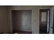 Bedroom with a walk-in closet and hardwood flooring at 3747 Southland Ct, Atlanta, GA 30344