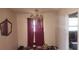 Dining room with chandelier and window view into another room at 3747 Southland Ct, Atlanta, GA 30344