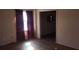 Living room features a window with purple curtains at 3747 Southland Ct, Atlanta, GA 30344