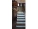 A staircase with exposed ceiling and in need of repairs at 3747 Southland Ct, Atlanta, GA 30344