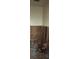 Exposed wall showing studs; potential for customization and renovation in this fixer-upper at 3747 Southland Ct, Atlanta, GA 30344