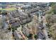 An aerial view showcases the community's layout, highlighting the diverse housing and neighborhood amenities at 6700 Roswell Rd # 32C, Atlanta, GA 30328