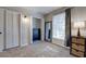Cozy bedroom featuring plush carpet, closet space, and neutral paint at 6700 Roswell Rd # 32C, Atlanta, GA 30328