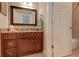 Bathroom featuring a wood vanity with granite countertop, large mirror, and a white door to the shower at 103 Old Avery Dr, Canton, GA 30115