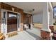 Cozy front porch with seating area and a 'Welcome' sign, perfect for relaxing outdoors at 3490 Mulberry Cove Way, Auburn, GA 30011