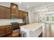 Beautiful kitchen with stainless steel appliances, an island, and dark wood cabinets at 709 Bismark Ne Rd, Atlanta, GA 30324