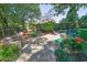 Inviting patio area surrounded by lush landscaping, perfect for outdoor relaxation at 2295 Hemrick Rd, Cumming, GA 30041