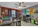 This bedroom features unique wall decor and a ceiling fan at 2295 Hemrick Rd, Cumming, GA 30041