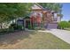 Lovely home with a well-manicured lawn and attractive landscaping features, adding to its curb appeal at 2295 Hemrick Rd, Cumming, GA 30041