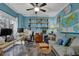 Inviting home office with built-in shelves, a large desk, and comfortable seating area at 2295 Hemrick Rd, Cumming, GA 30041