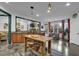 Gourmet kitchen with an island, stainless steel appliances, and bar-style seating at 2295 Hemrick Rd, Cumming, GA 30041