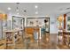 Open kitchen with stainless steel appliances, ample counter space, and eat-in breakfast area at 2295 Hemrick Rd, Cumming, GA 30041