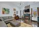 Inviting living room with a decorative fireplace, comfortable seating, and a bright and airy atmosphere at 2295 Hemrick Rd, Cumming, GA 30041