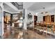 Open-concept living space with views of the dining area and staircase, creating a seamless flow at 2295 Hemrick Rd, Cumming, GA 30041
