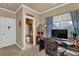 Home office with neutral walls, a large window and a view to a bathroom at 2295 Hemrick Rd, Cumming, GA 30041
