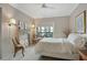 Comfortable bedroom showcasing natural light and a stylish fireplace with decorative accents at 2310 River Green Nw Dr, Atlanta, GA 30327