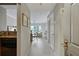 Hallway view looking into the living area, with view of kitchen and doors to other rooms at 2310 River Green Nw Dr, Atlanta, GA 30327