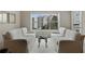 Living room showcasing neutral tones and comfortable seating with a large window view at 2310 River Green Nw Dr, Atlanta, GA 30327