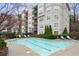 Inviting outdoor pool with lounge chairs and lush landscaping for relaxation at 2310 River Green Nw Dr, Atlanta, GA 30327