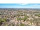 Aerial view of homes nestled among lush, mature trees in a well-established suburban neighborhood at 9470 Dominion Way, Alpharetta, GA 30022