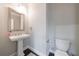 Elegant powder room with pedestal sink and modern fixtures at 3152 Quinn Pl, Atlanta, GA 30341