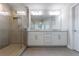 Modern bathroom features a glass shower and double vanity at 3152 Quinn Pl, Atlanta, GA 30341