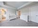 Bright bedroom with neutral carpeting and ensuite bathroom access at 3152 Quinn Pl, Atlanta, GA 30341