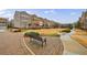Landscaped common area with benches, perfect for relaxation and socializing within the residential neighborhood at 3152 Quinn Pl, Atlanta, GA 30341