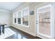 Bright dining area with access to the outdoor deck and abundant natural light at 3152 Quinn Pl, Atlanta, GA 30341