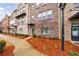 Townhomes with brick facade and pine straw at 3152 Quinn Pl, Atlanta, GA 30341