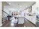 Modern kitchen featuring white cabinets, stainless steel appliances, and an open layout at 3152 Quinn Pl, Atlanta, GA 30341